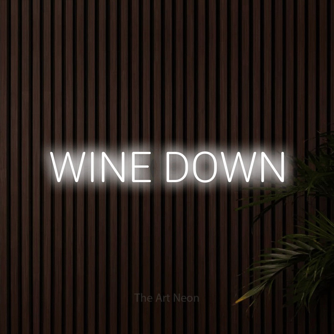 Cool white LED neon sign reading "Wine Down" against dark wooden slats for kitchen décor