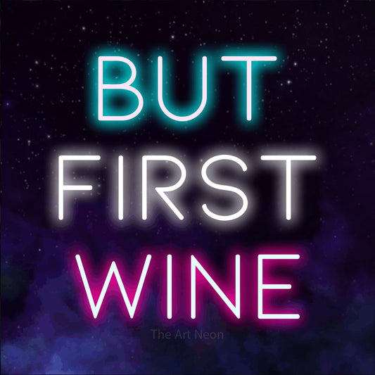 Multicolour LED neon sign reading "But First Wine" against a purple galaxy background for kitchen décor