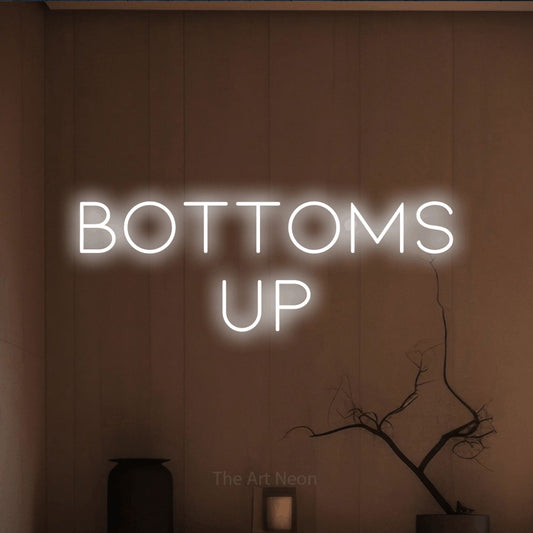 Cool white LED neon sign reading "Bottoms Up" against a warm brown wall for kitchen décor