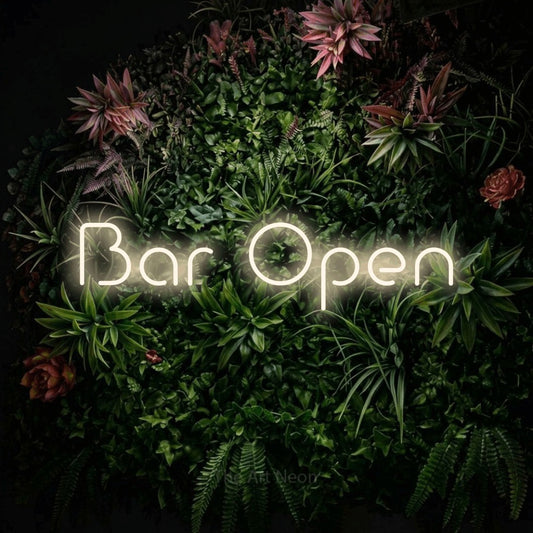 Warm white LED neon sign reading "Bar Open" against a flowering garden wall for bar décor