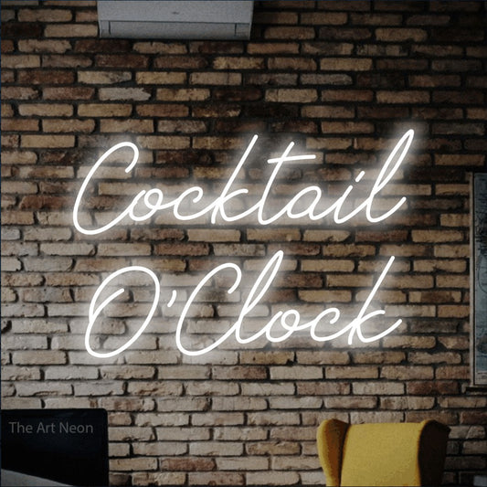 Cool white script-style LED neon sign reading "Cocktail O'Clock" against a rustic brick wall for bar décor