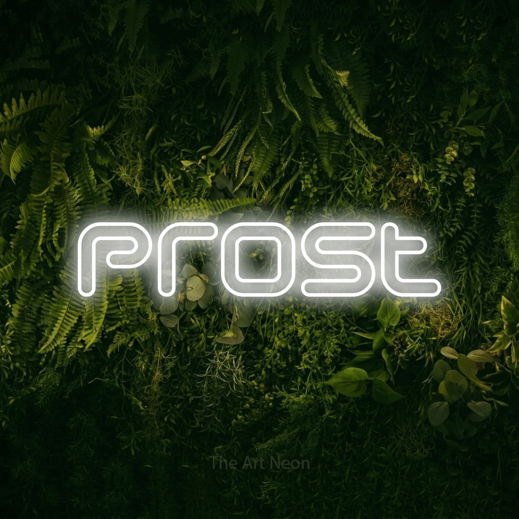 Cool white outline-style LED neon sign reading "Prost" against a moss-covered green wall for bar décor