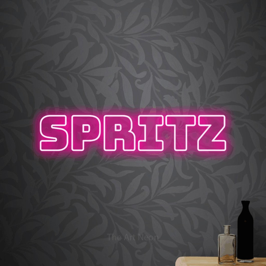 Hot pink outline-style LED neon sign reading "Spritz" against light grey floral wallpaper for bar décor