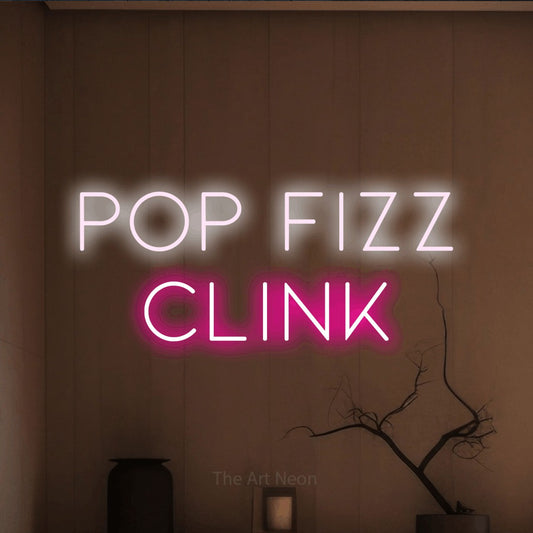 Hot pink and cool white LED neon sign reading "Pop Fizz Clink" against a warm brown wall for bar décor