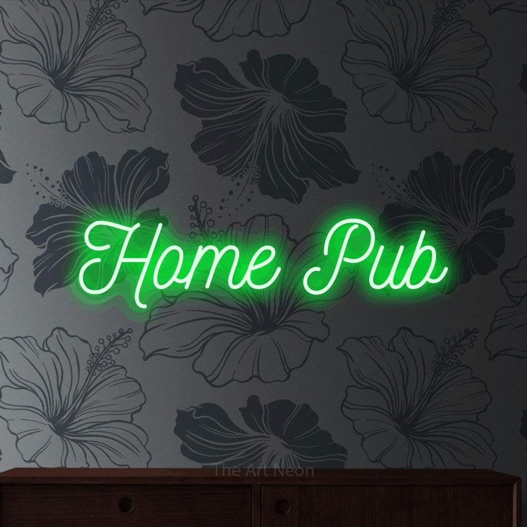 Green script-style LED neon sign reading "Home Pub" against grey floral wallpaper for bar décor