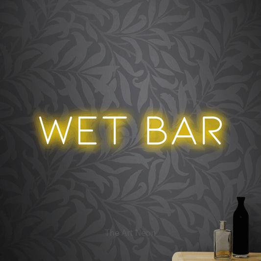 Yellow LED neon sign reading "Wet Bar" against light grey floral wallpaper for bar décor