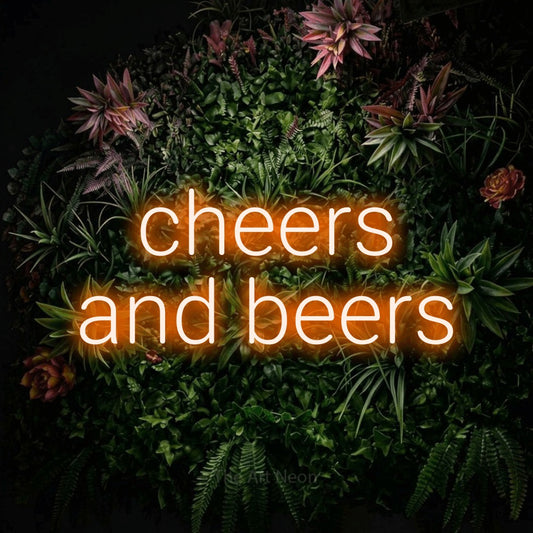 Orange LED neon sign reading "Cheers and Beers" against a flowering garden wall for bar décor