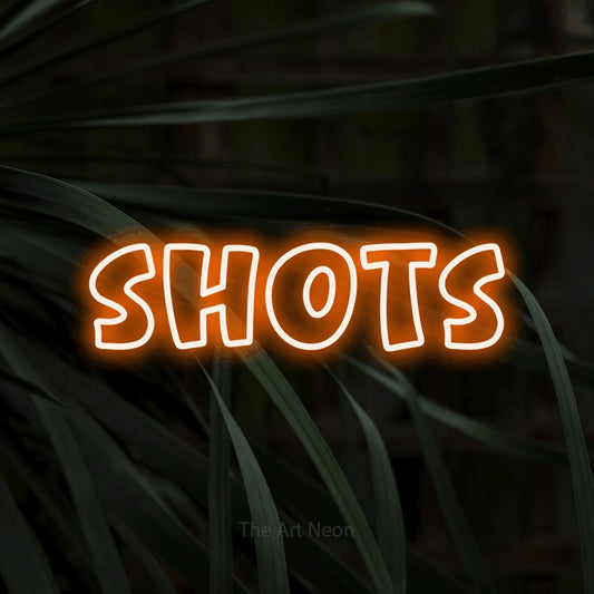 Orange outline-style LED neon sign reading "Shots" against dark tropical leaves for bar décor