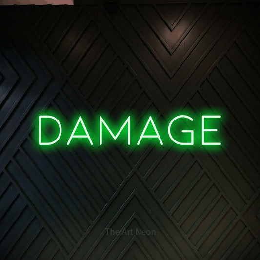 Green LED neon sign reading "Damage" against a dark geometric wood wall for gaming room décor
