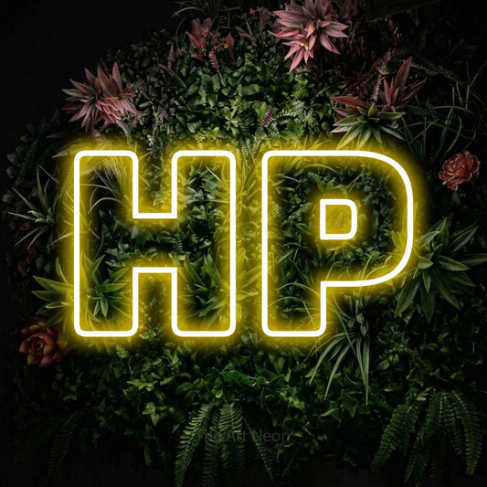 Yellow outline-style LED neon sign reading "HP" against a flowering garden wall for gaming room décor