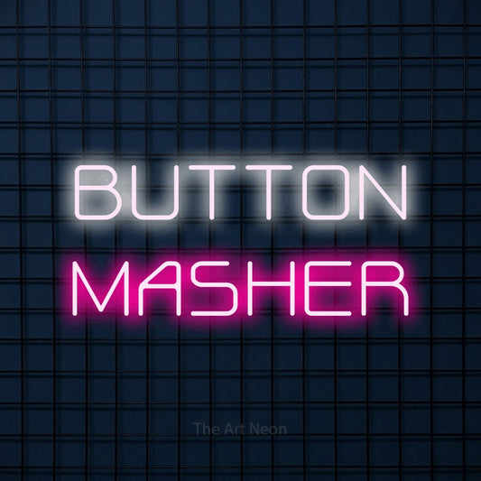 Hot pink and cool white LED neon sign reading "Button Masher" against a dark blue tiled wall for gaming room décor