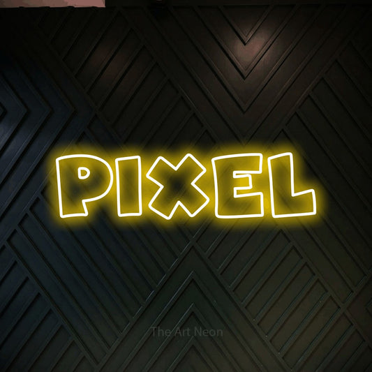 Yellow outline-style LED neon sign reading "Pixel" against a dark geometric wood wall for gaming room décor