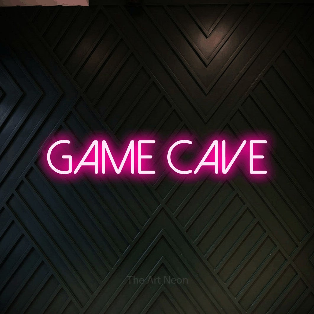 Enseigne néon à DEL à lumière rose vif, affichant « Game Cave » sur un mur géométrique en bois foncé, pour décorer une salle de jeu