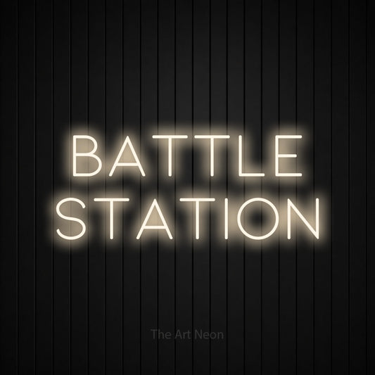 Warm white LED neon sign reading "Battle Station" against a black vertical slat wall for gaming room décor