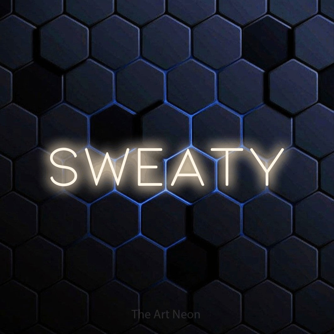 Warm white LED neon sign reading "Sweaty" against a blue hexagonal wall for gaming room décor