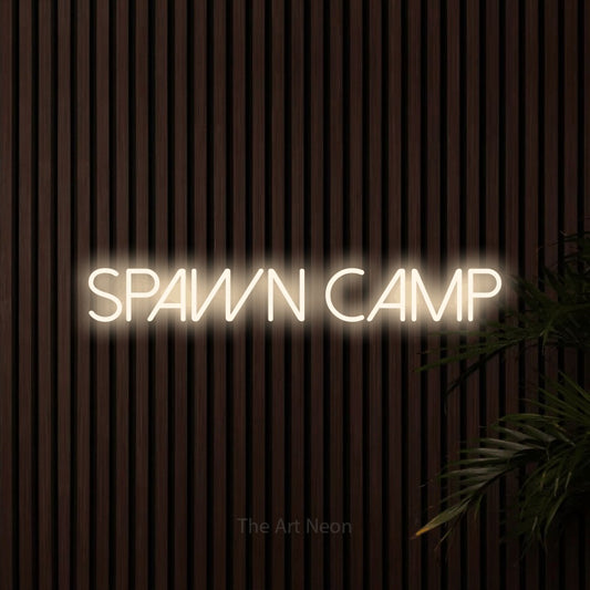 Warm white LED neon sign reading "Spawn Camp" against dark wooden slats for gaming room décor