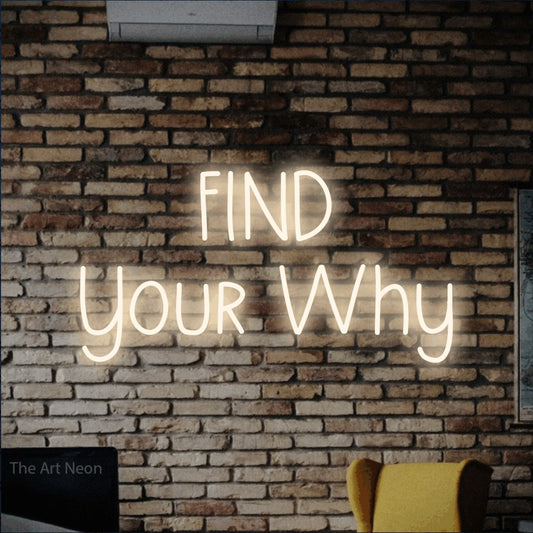 Warm white LED neon sign reading "Find Your Why" against a rustic brick wall