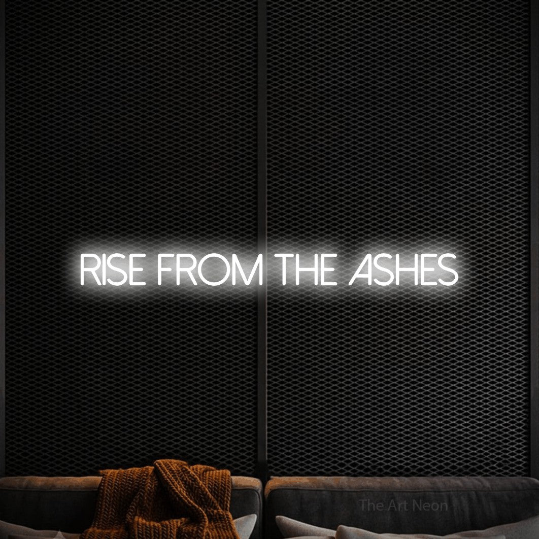 Cool white LED neon sign reading "Rise from the Ashes" against a black textured wall