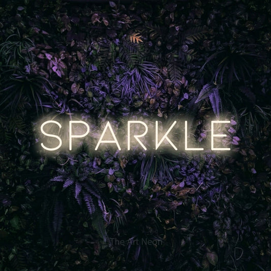 Enseigne néon à DEL à lumière blanche chaude, de style contour, affichant « Sparkle » sur un mur floral violet