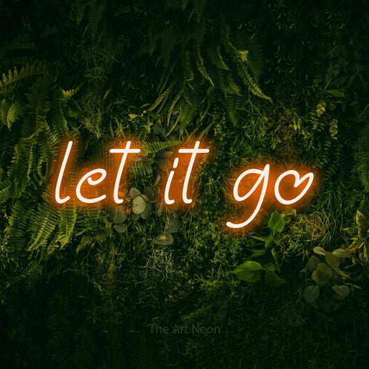 Orange LED neon sign reading "Let It Go" against a moss-covered green wall