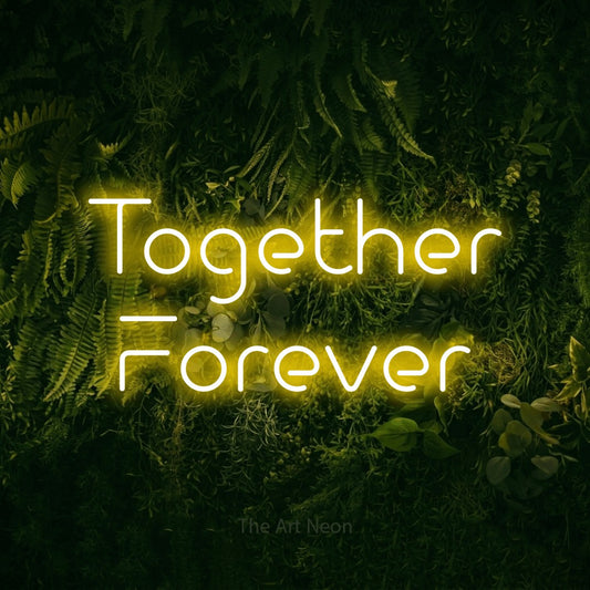 Yellow LED neon sign reading "Together Forever" against a moss-covered green wall