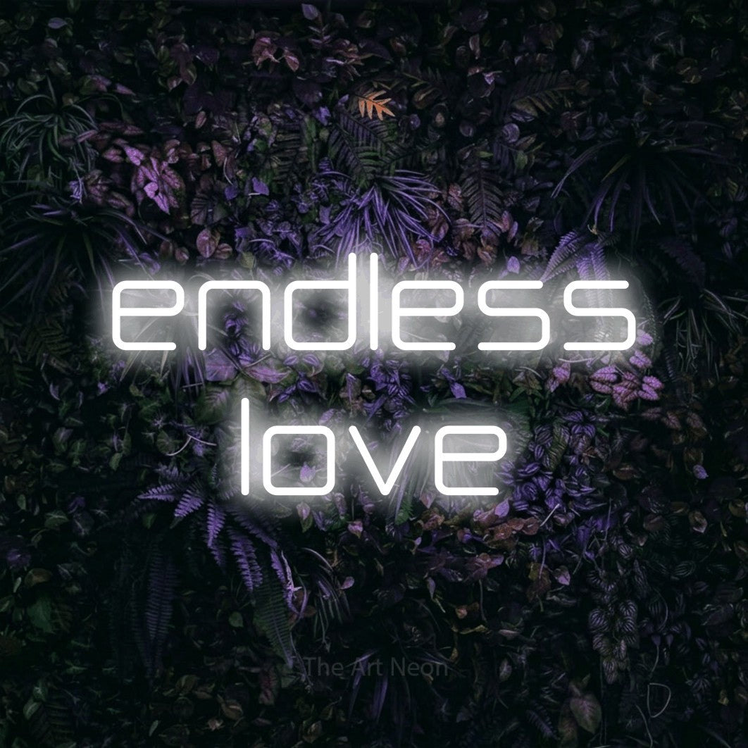 Cool white LED neon sign reading "Endless Love" against a purple floral wall