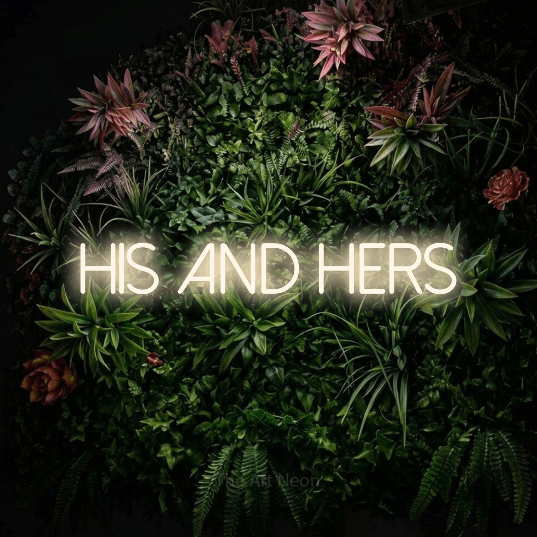Warm white LED neon sign reading "His and Hers" against a flowering garden wall
