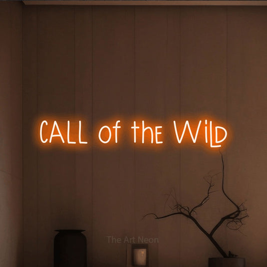 Orange LED neon sign reading "Call of the Wild" against a warm brown wall