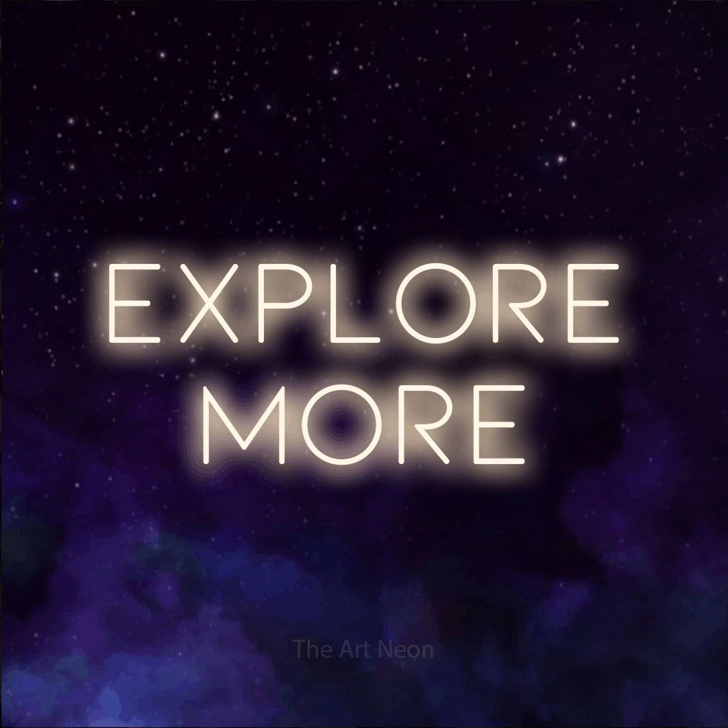 Warm white LED neon sign reading "Explore More" against a purple galaxy background