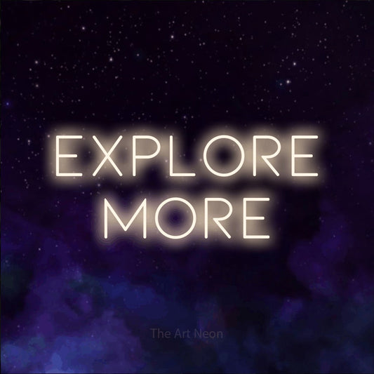 Warm white LED neon sign reading "Explore More" against a purple galaxy background