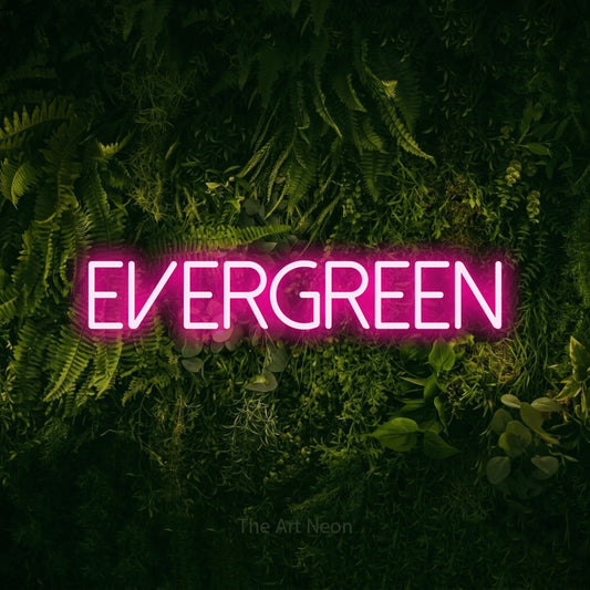 Hot pink LED neon sign reading "Evergreen" against a moss-covered green wall