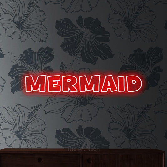 Red outline-style LED neon sign reading "Mermaid" against grey floral wallpaper
