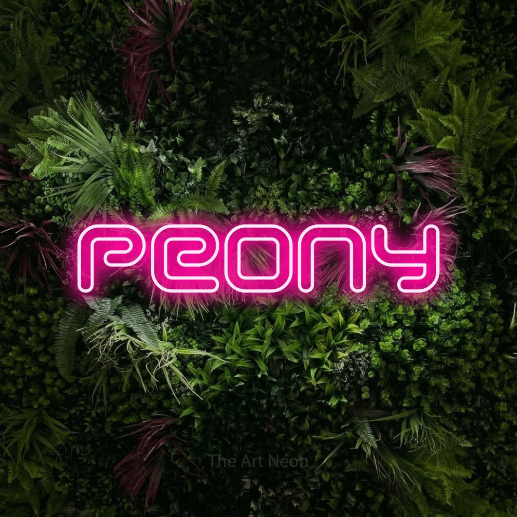 Hot pink outline-style LED neon sign reading "Peony" against a lush garden wall with pink flowers