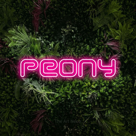 Hot pink outline-style LED neon sign reading "Peony" against a lush garden wall with pink flowers