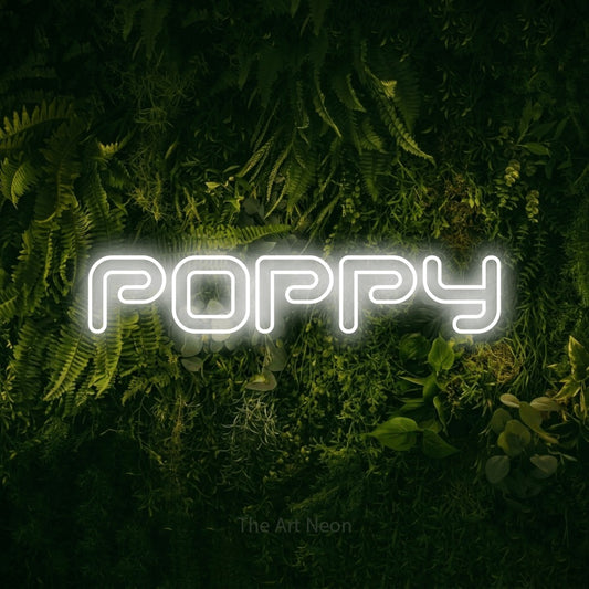 Cool white outline-style LED neon sign reading "Poppy" against a moss-covered green wall