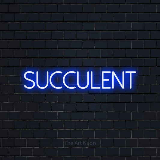Blue LED neon sign reading "Succulent" against a dark navy brick wall