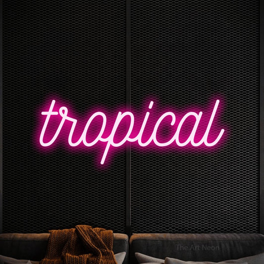 Hot pink script-style LED neon sign reading "Tropical" against a black textured wall