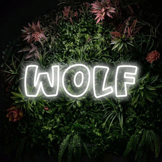 Cool white outline-style LED neon sign reading "Wolf" against a flowering garden wall