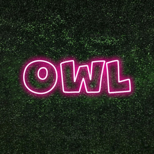 Hot pink outline-style LED neon sign reading "Owl" against a textured green moss wall