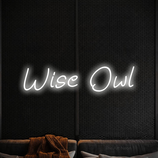 Cool white LED neon sign reading "Wise Owl" against a black textured wall