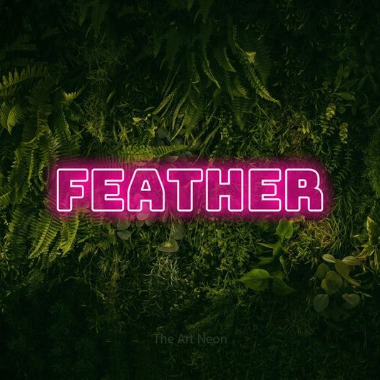 Hot pink outline-style LED neon sign reading "Feather" against a moss-covered green wall