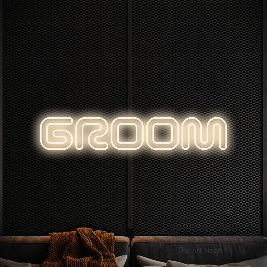 Warm white outline-style LED neon sign reading "Groom" against a black textured wall for wedding décor