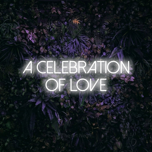 Cool white LED neon sign reading "A Celebration of Love" against a purple floral wall for wedding décor
