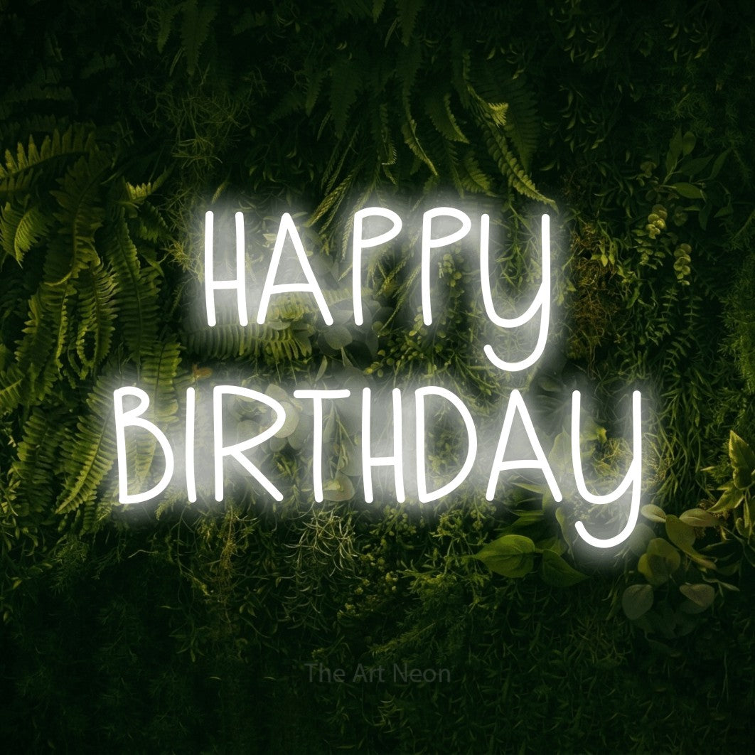 Cool white LED neon sign reading "Happy Birthday" against a moss-covered green wall for party décor
