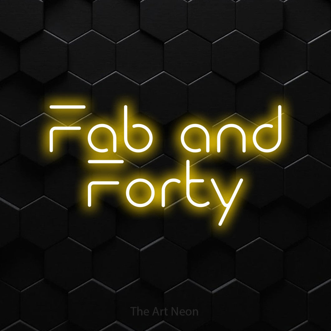 Yellow LED neon sign reading "Fab and Forty" against a black hexagonal wall for party décor