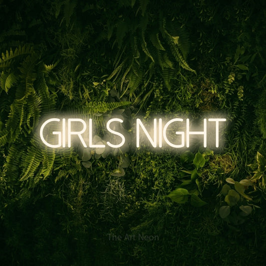 Warm white LED neon sign reading "Girls Night" against a moss-covered green wall for party décor
