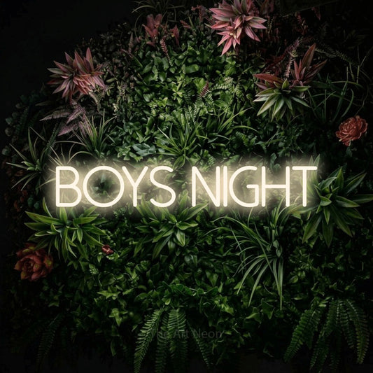 Warm white LED neon sign reading "Boys Night" against a flowering garden wall for party décor