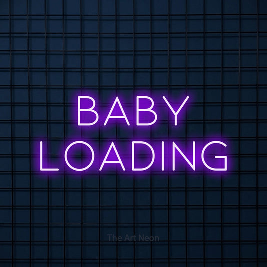 Purple LED neon sign reading "Baby Loading" against a dark blue tiled wall