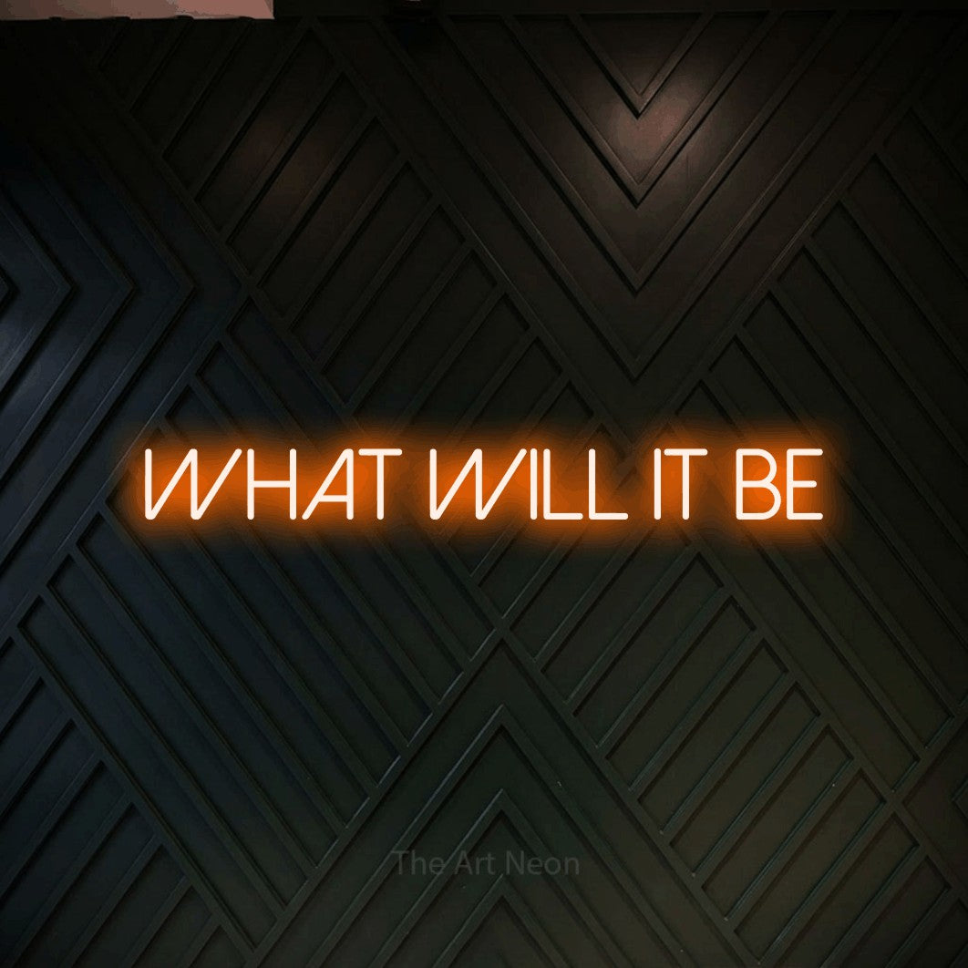 Orange LED neon sign reading "What Will It Be" against a dark geometric wood wall