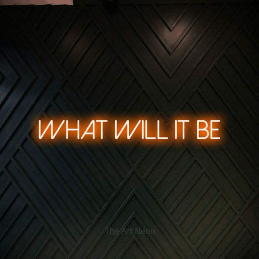 Orange LED neon sign reading "What Will It Be" against a dark geometric wood wall